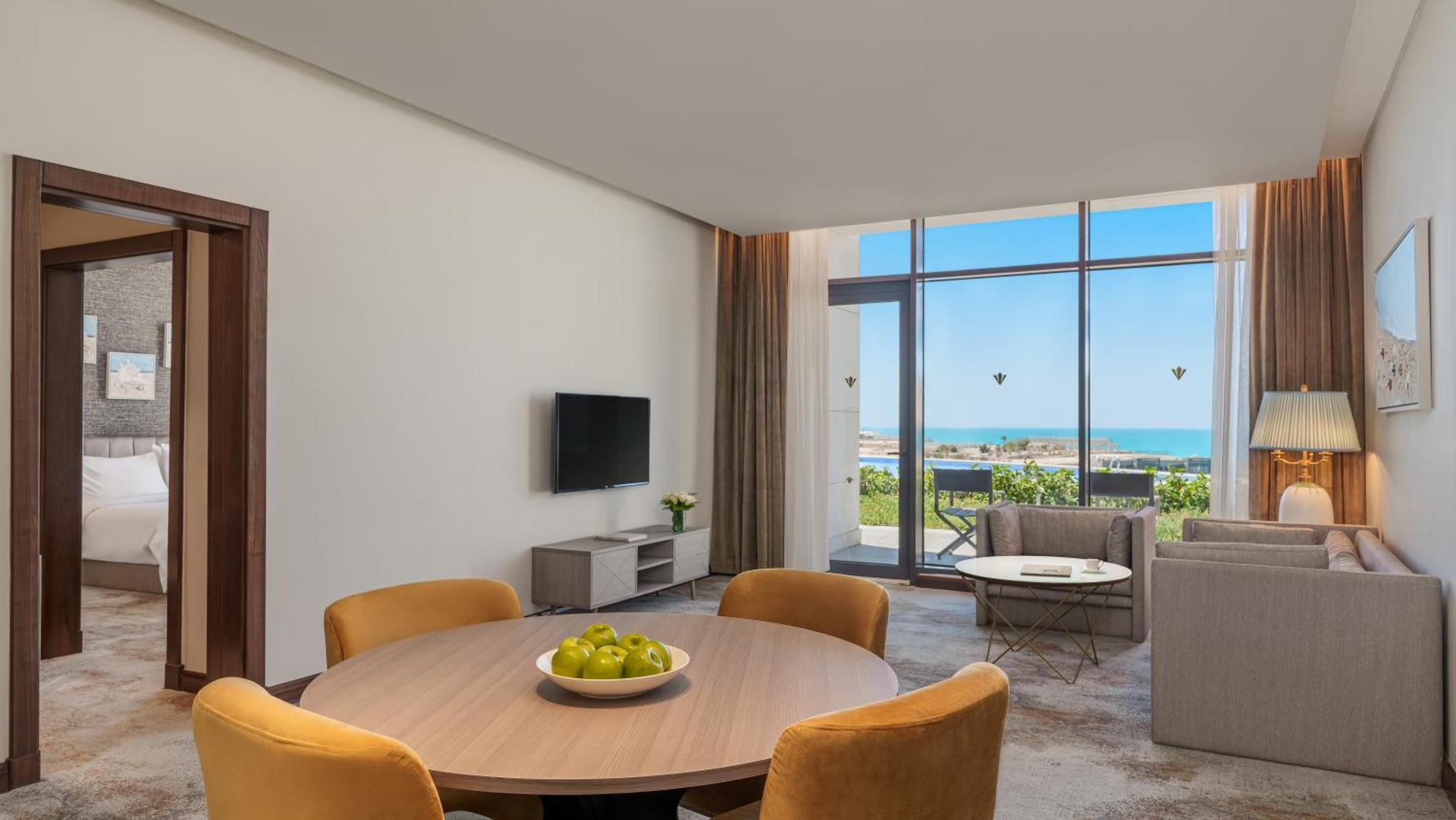 Rixos Premium Alamein El Alamein Kamer foto A living room at the hotel