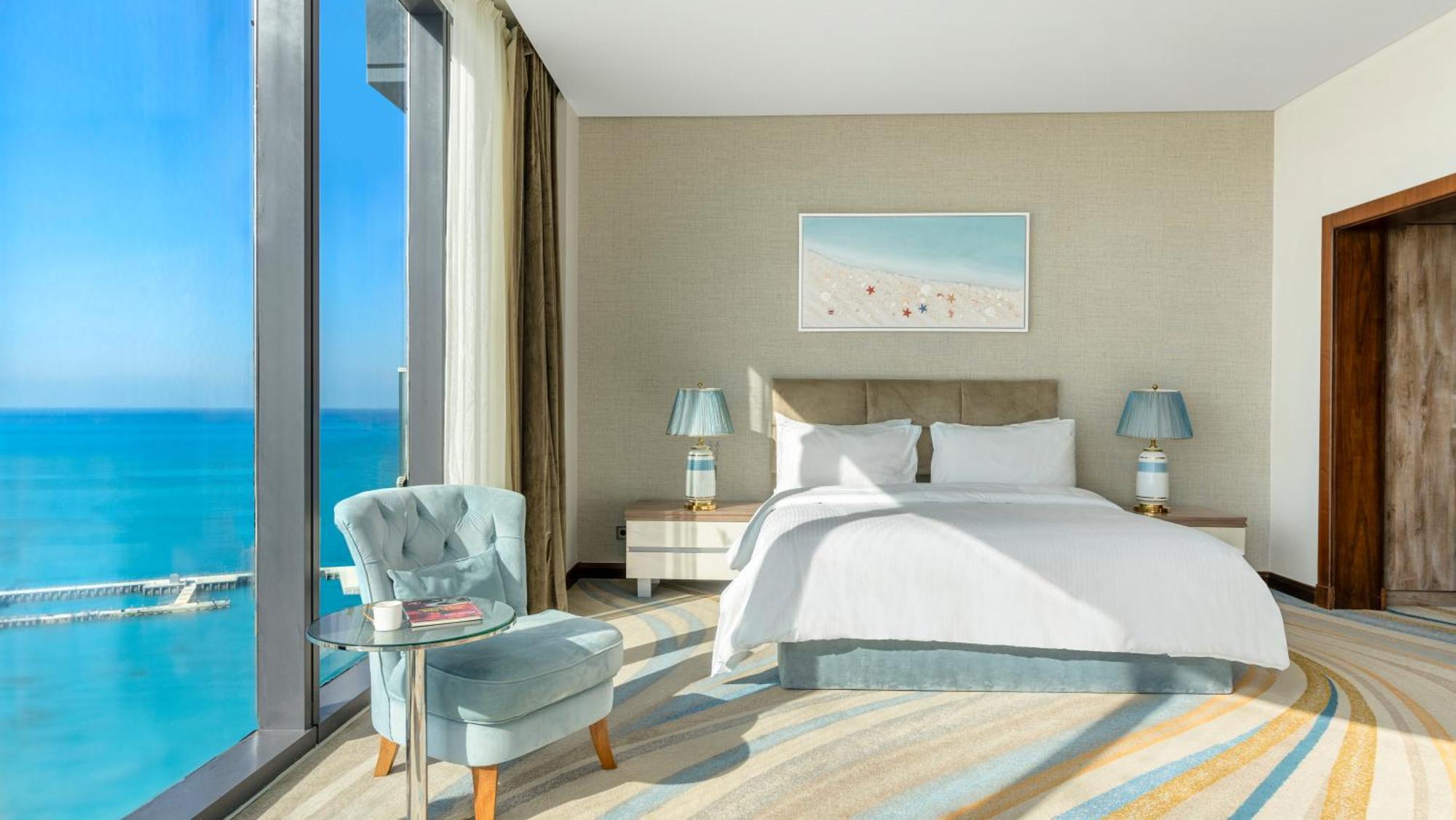 Rixos Premium Alamein El Alamein Kamer foto A bedroom at the hotel